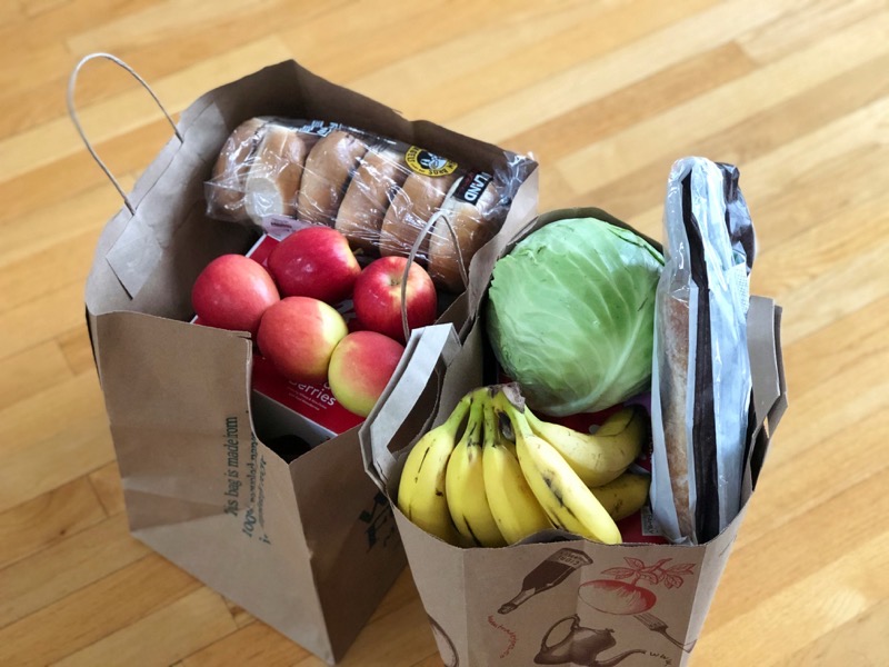 A bag of fresh groceries on a home kitchen counter
